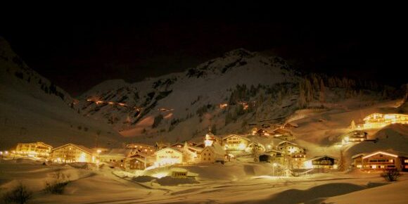 The majestic village of Stuben in the night with all the lights on.